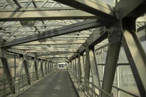 Bridge beams made of steel. Bridge construction. Pedestrian crossing over the highway. photo