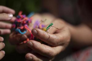 Elderly woman's hands in the sunlight photo