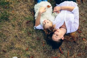 Mother and little daughter in a park photo