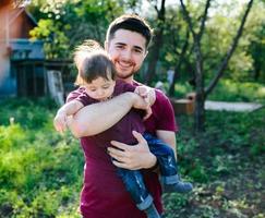 young family with a child on the nature photo