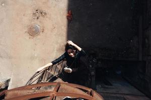 Girl posing on a spiral staircase photo