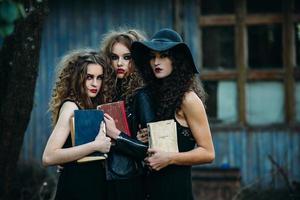 three vintage women as witches photo