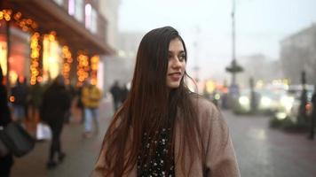 Woman walking on busy street at evening video