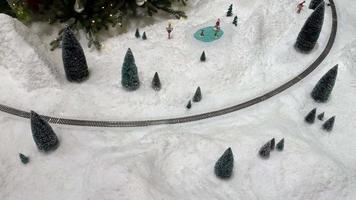 Electric train in the snow, christmas toy video