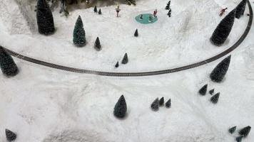 Electric train in the snow, christmas toy video