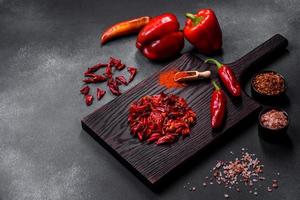 Pieces of dried paprika, preparation of powder spice for various dishes