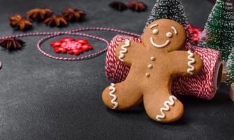 Delicious gingerbread cookies with honey, ginger and cinnamon. Winter composition photo