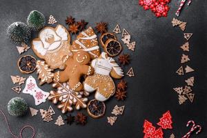 Delicious gingerbread cookies with honey, ginger and cinnamon. Winter composition photo