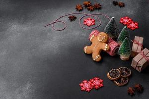 Delicious gingerbread cookies with honey, ginger and cinnamon. Winter composition photo