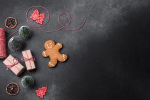 Delicious gingerbread cookies with honey, ginger and cinnamon. Winter composition photo