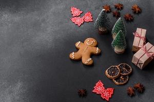 Delicious gingerbread cookies with honey, ginger and cinnamon. Winter composition photo