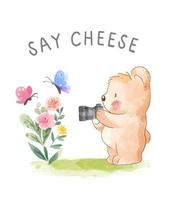 say cheese slogan with cute bear taking picture illustration vector