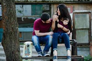 young family with a child on the nature photo