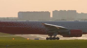 MOSCOW, RUSSIAN FEDERATION SEPTEMBER 12, 2020 - Rossiya Airlines Boeing 777 airliner taxiing to runway for departure video