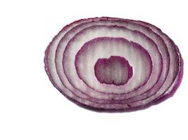 A slice of lilac onion on a white background. photo