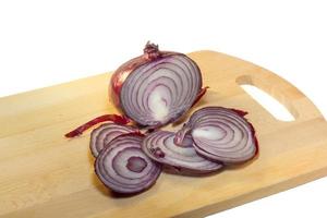 Lilac onion cut into slices. photo