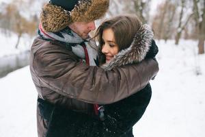 man and woman hugging, close view photo