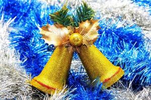 Decorative golden bells for Christmas and New Year photo