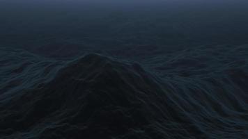 Dark ocean waves undulate and flow - Loop video