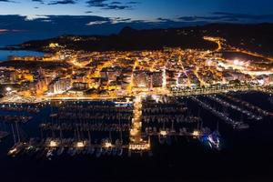 Aerial view of city port at night. photo