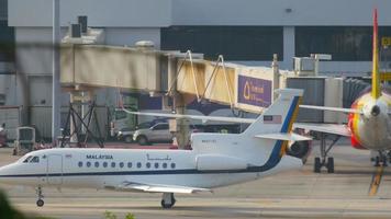 PHUKET, THAILAND NOVEMBER 27, 2016 - Malaysia Air Force Dassault Falcon 900 taxiing in Phuket airport video