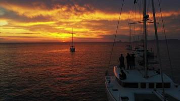 Aerial view from drone on boats shipping in sea, sunset photo