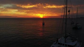 Aerial view from drone on boats shipping in sea, sunset photo