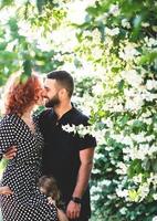 loving guy and girl posing together on camera photo