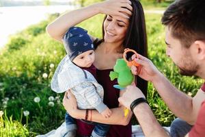 young family with a child on the nature photo