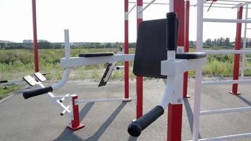 Bars on the street sports ground, outdoor training. Simulators of street sports. Deserted open area without people, with sports equipment. Sports concept. Workout. video