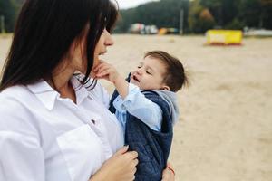 Happy mother with her young son photo