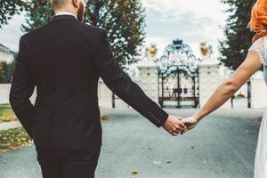 Wedding couple close up on hands photo