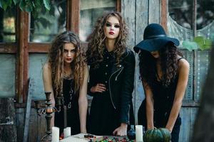 three witches at the table photo