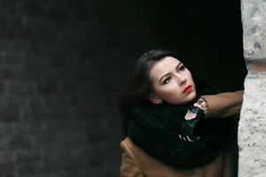 Charming fashion female modell in a coat. photo