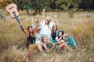 Six girls in nature have fun photo