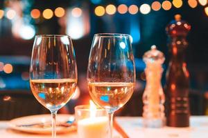 photo of two champagner glasses on table