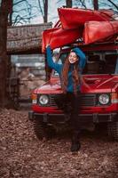 Beautiful young girl posing outdoor on camera photo