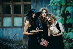 three vintage women as witches photo