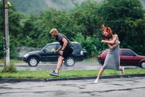 beautiful couple in the rain photo