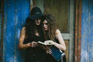 two vintage women as witches photo