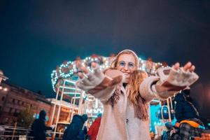 Front view girl on defocus background bokeh light in evening street photo