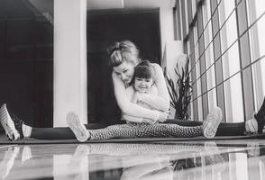 Charming family spends time in the gym photo