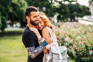 Cute couple in summer park photo