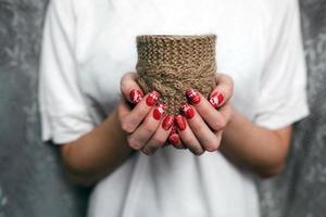 Girl holding a small lovely heart photo
