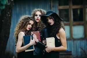 three vintage women as witches photo