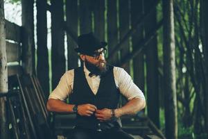 man in a hangar with subdued light photo