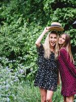Two girls in a summer park photo