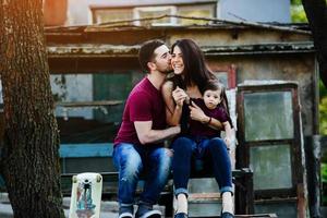 young family with a child on the nature photo