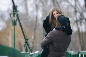 beautiful couple on a bridge photo