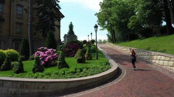 Athlete woman jogging in park. Sport woman at morning workout photo